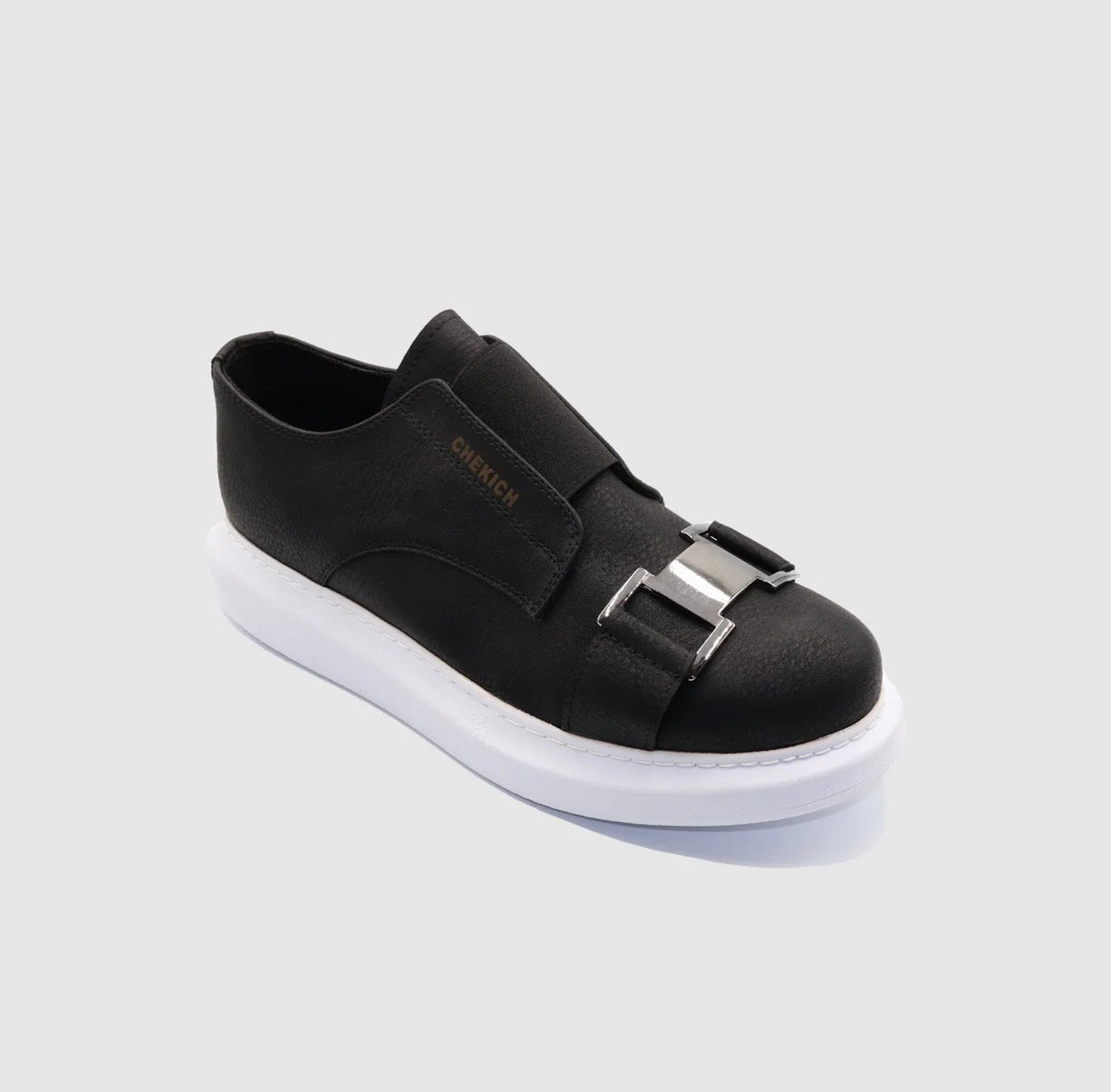 Black and white Chekich slip-on
