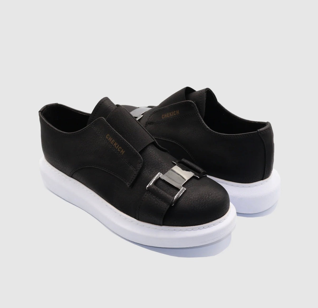 Black and white Chekich slip-on