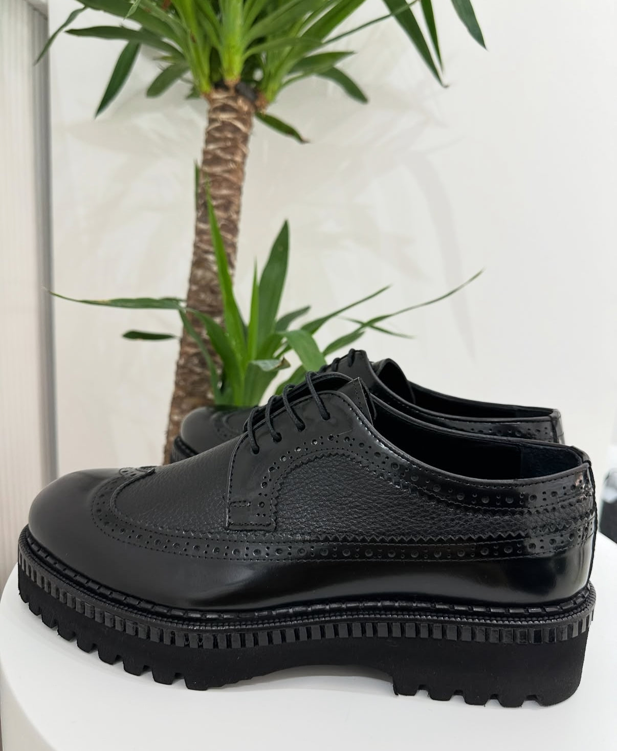 Black Pebbled Leather
Wing-Tip Brogue Platform Shoes